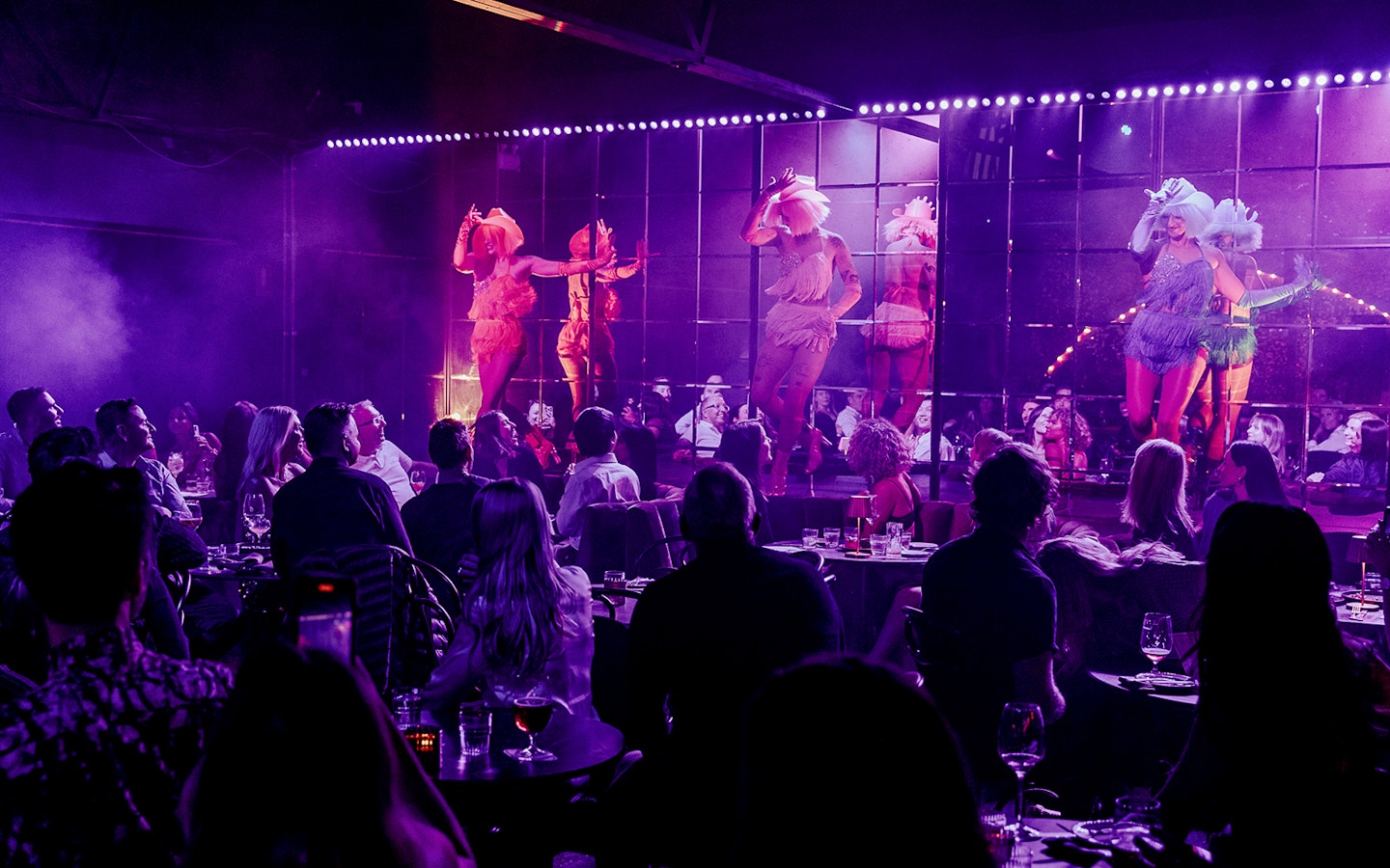 Cabaret performance at The Emerald Room with audience enjoying the show.