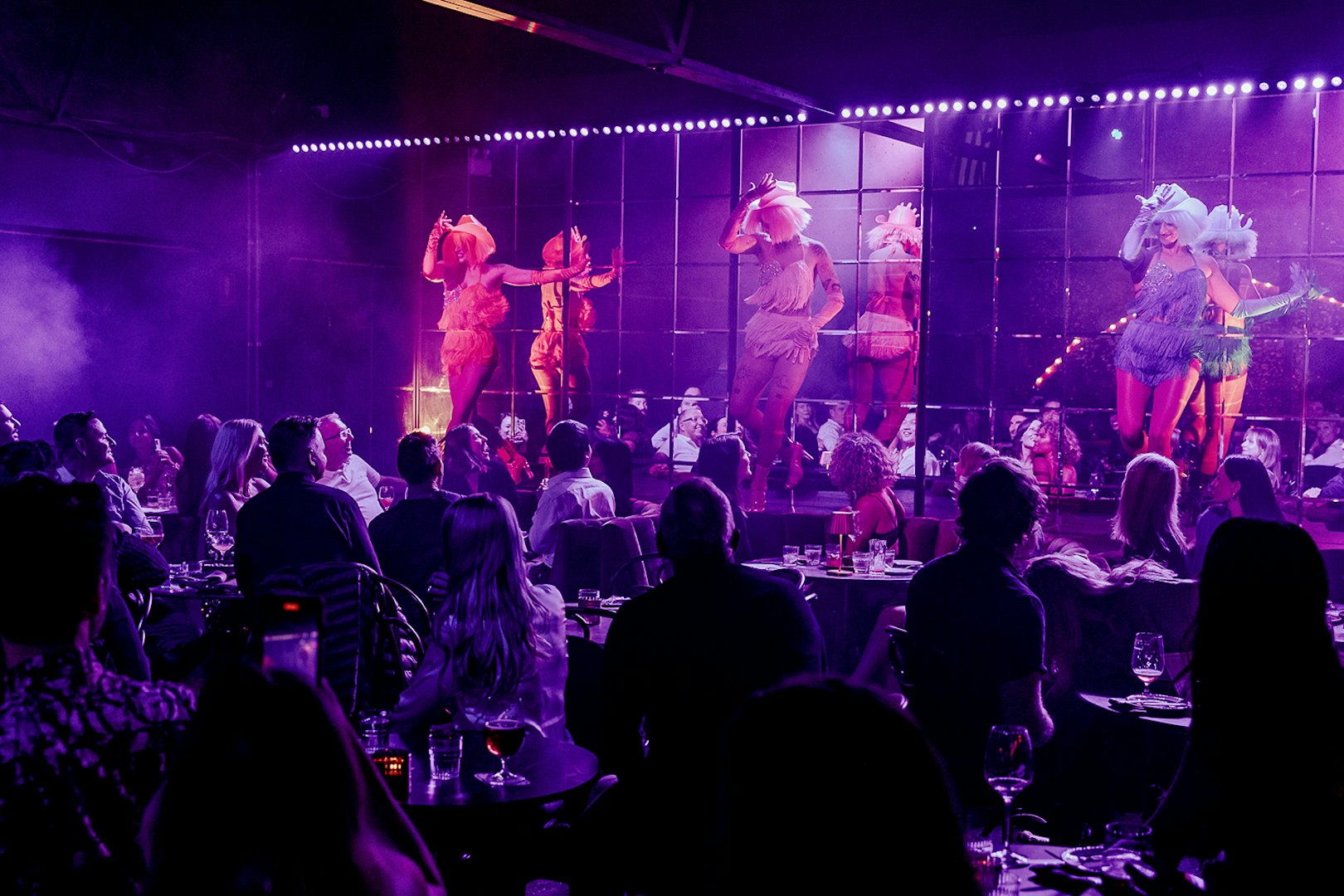 Cabaret performance at The Emerald Room with audience enjoying the show.