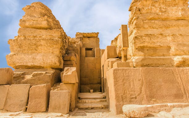 Ancient stone entrance at Giza Pyramids, Cairo, Egypt.