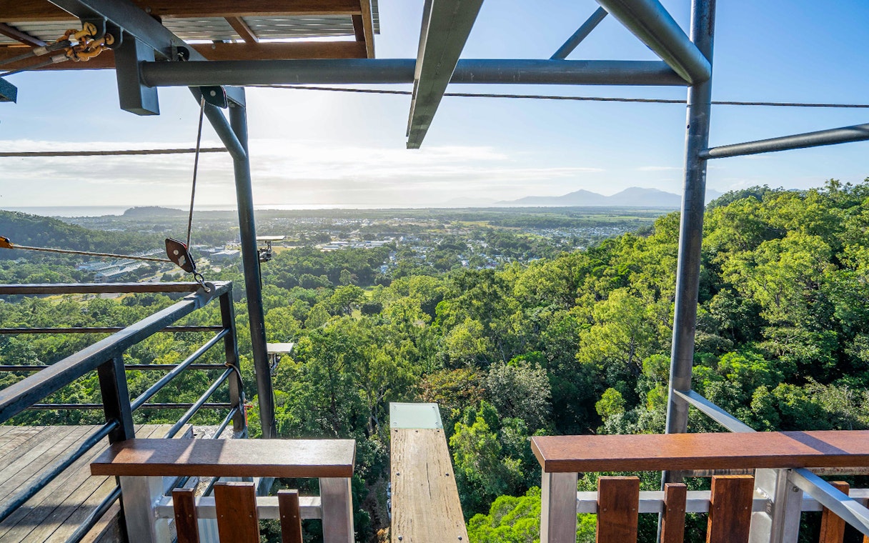Walk The Plank platform overlooking lush forest and distant mountains at AJ Hackett.