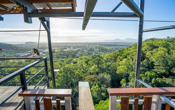 Walk The Plank platform overlooking lush forest and distant mountains at AJ Hackett.