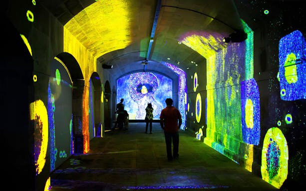 Immersive Monet and Klimt projections at Immersivus Gallery with visitors exploring.