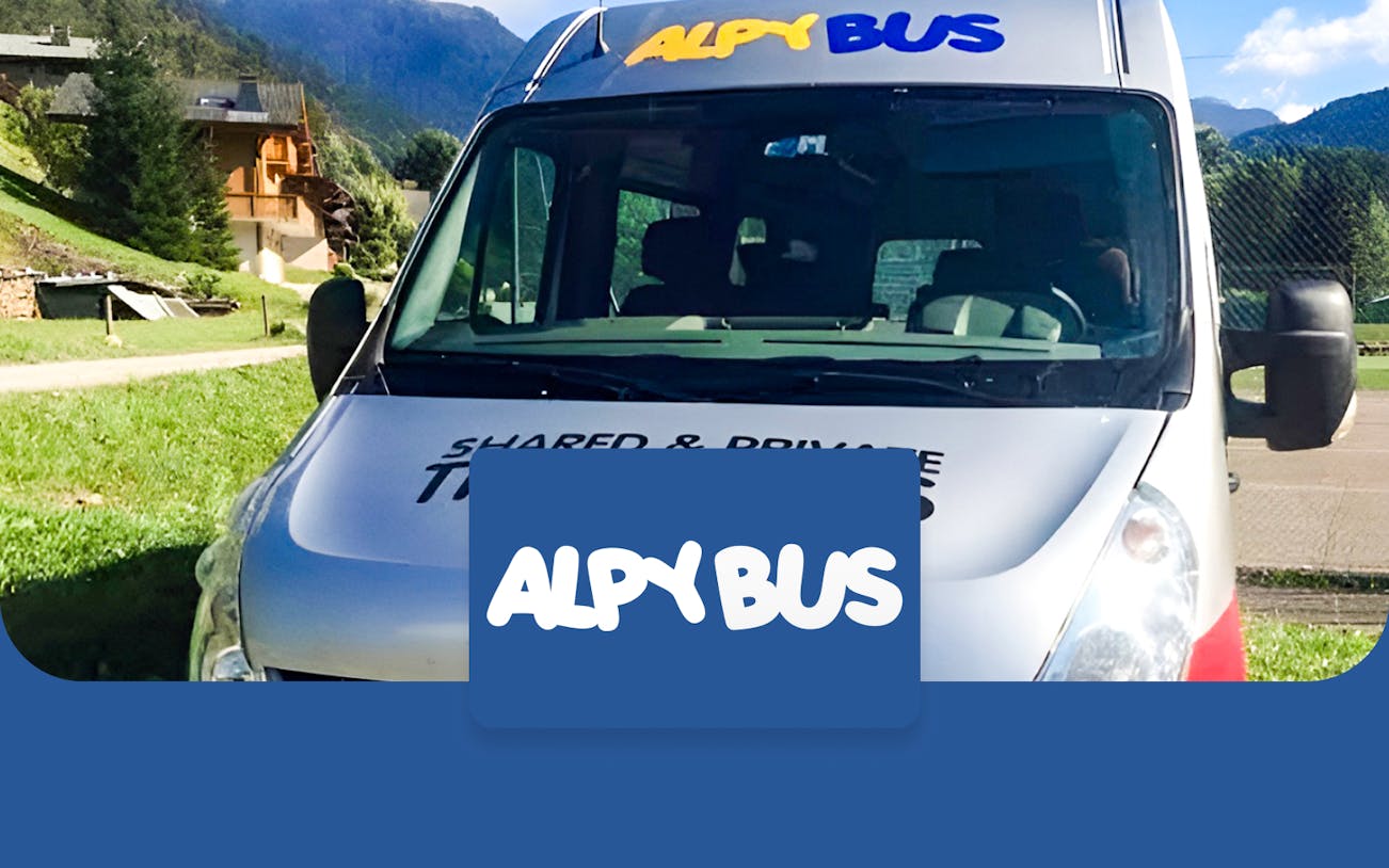 Alpybus vehicle parked with mountain backdrop, Geneva Airport to Chamonix Sud route.