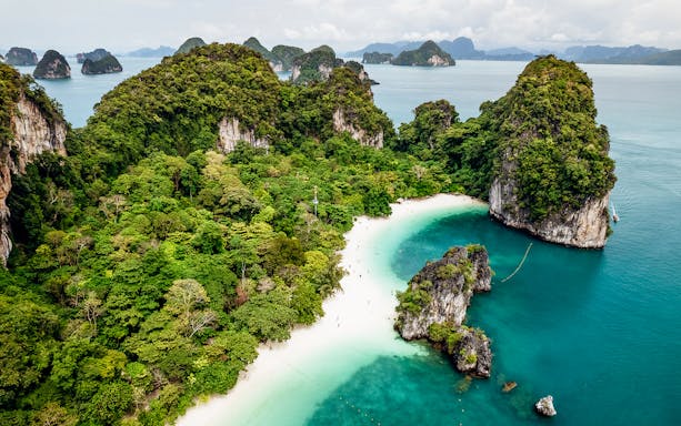 Aerial view of Krabi's lush islands and turquoise waters on a private longtail boat tour.