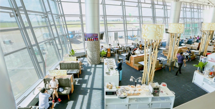 Rose Business Lounge seating and buffet area, Terminal 2, Tan Son Nhat International Airport.