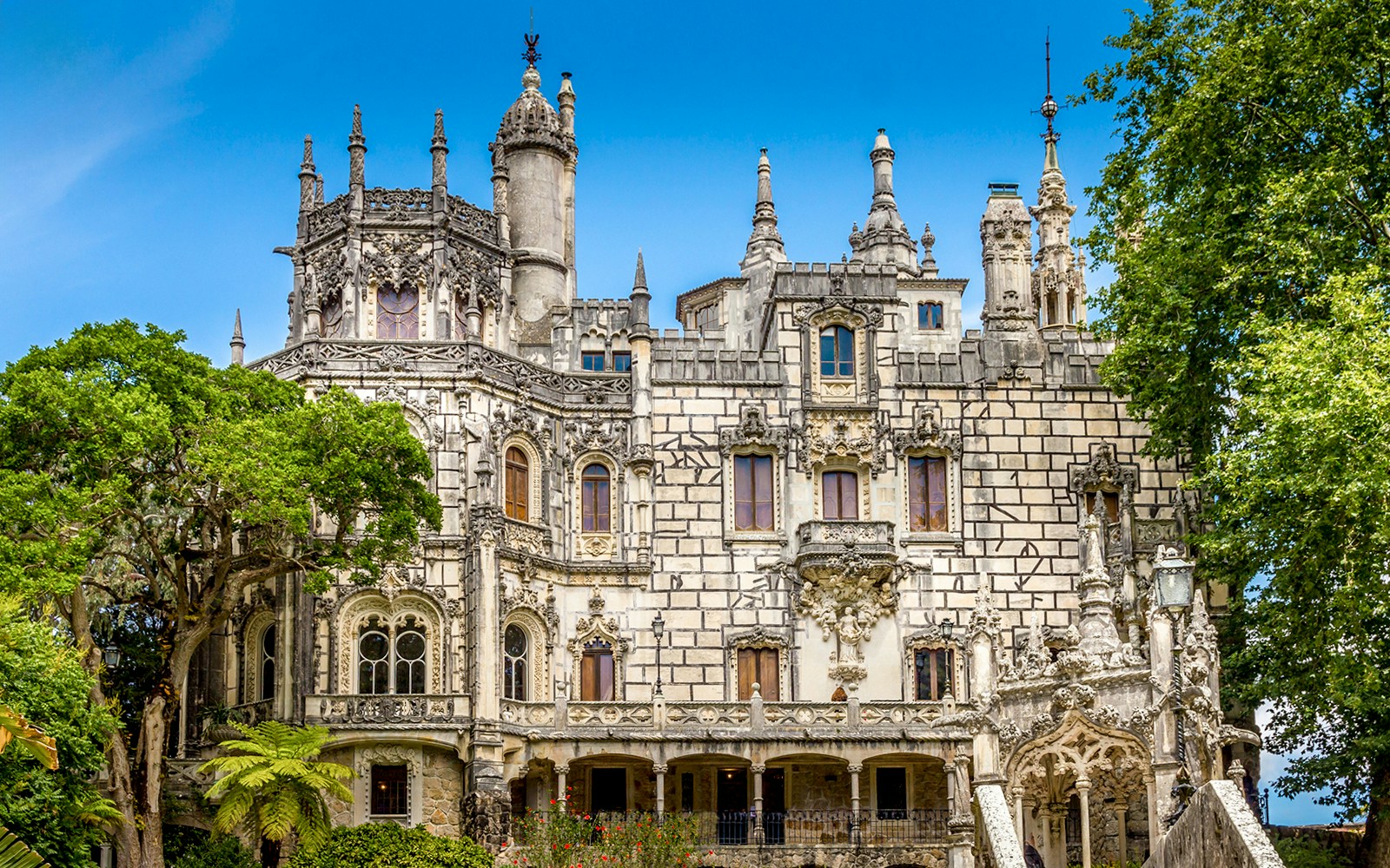 Quinta da Regaleira palace facade with ornate Gothic architecture in Sintra, Portugal.
