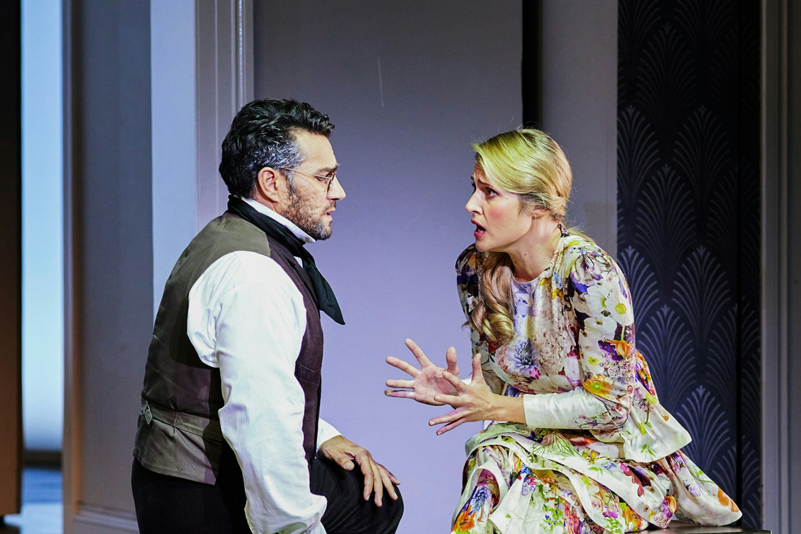 Opera performers in a dramatic scene from La Traviata at Sydney Opera House.