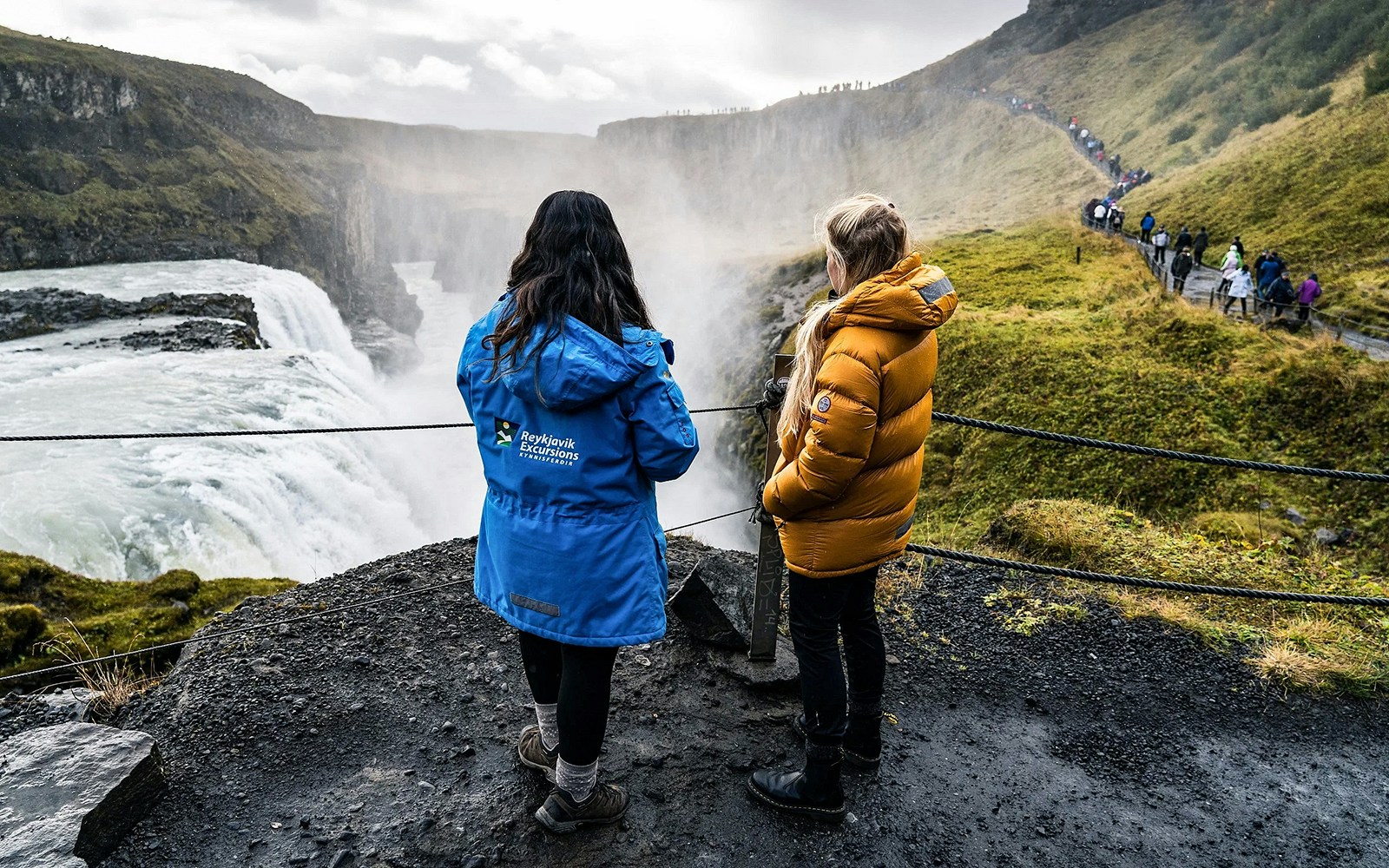 Why visit the Geysir geothermal area?