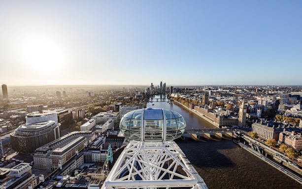 London Eye capsule overlooking River Thames and cityscape.