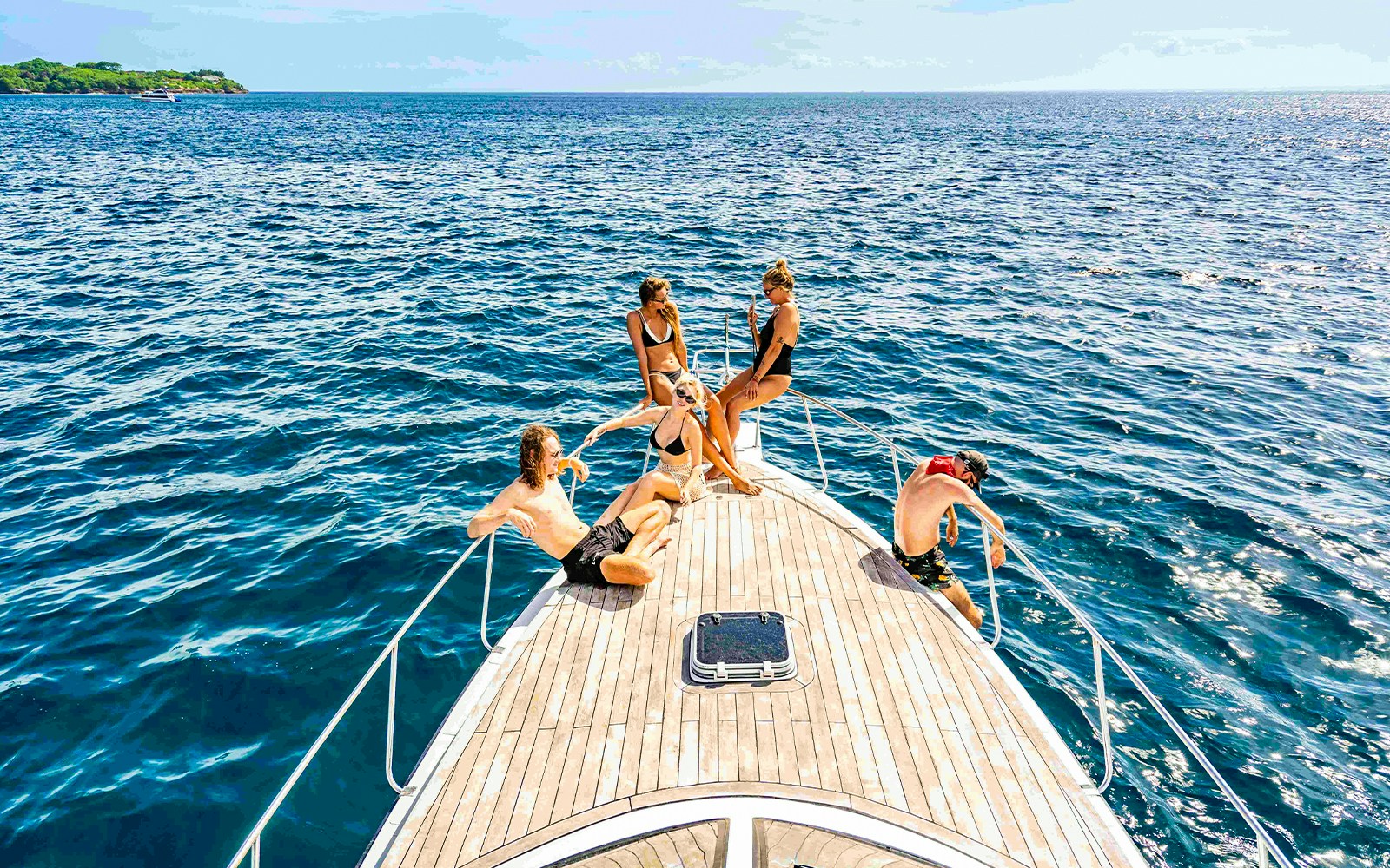 Nusa Penida & Manta Point Snorkelling Day Tour participants exploring vibrant underwater coral reefs and marine life in Bali