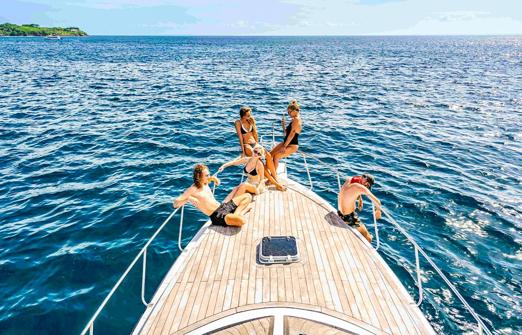 Nusa Penida & Manta Point Snorkelling Day Tour participants exploring vibrant underwater coral reefs and marine life in Bali
