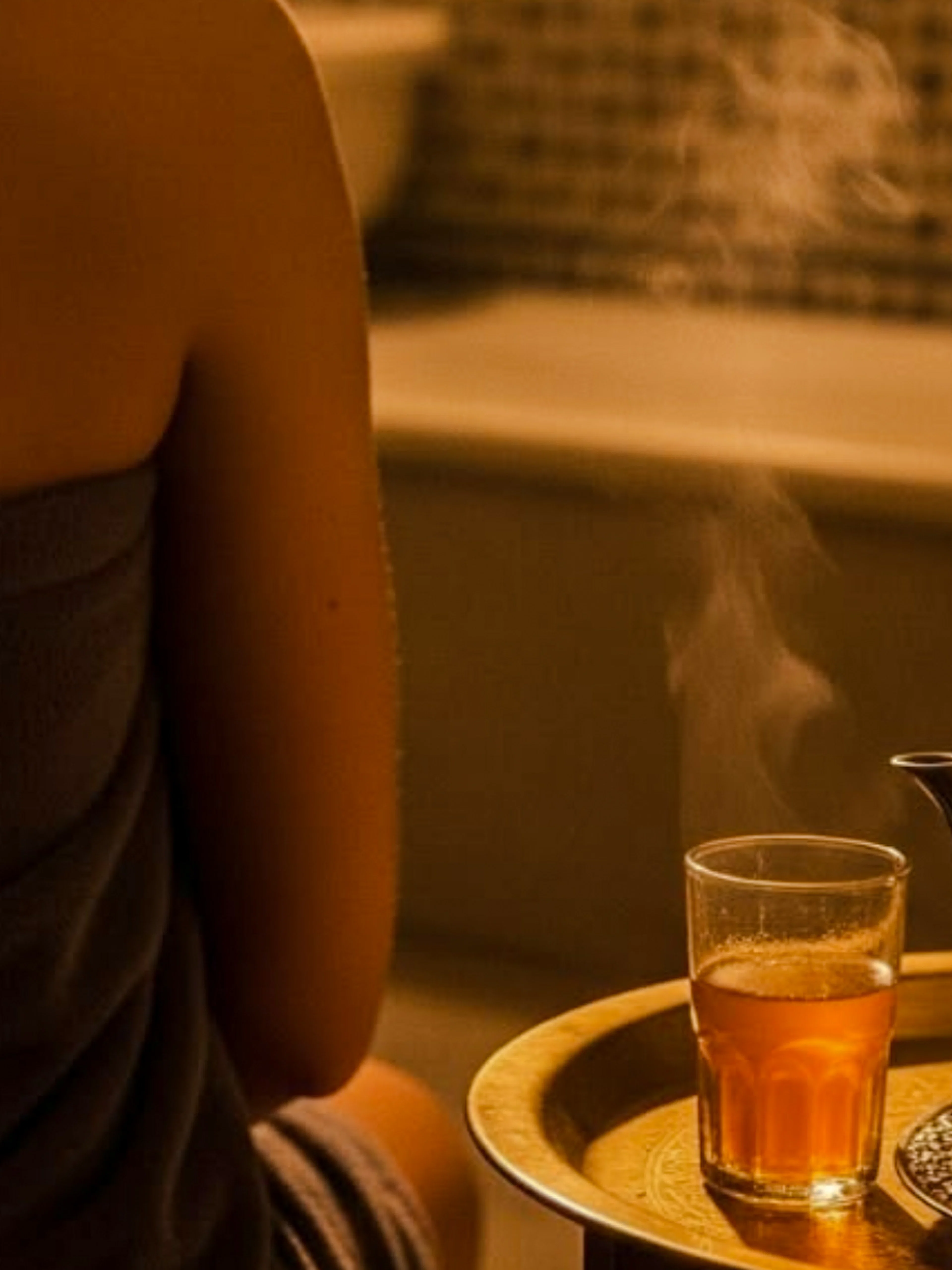 Steaming tea and teapot in a Marrakchi hammam, Marrakesh.