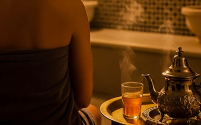 Steaming tea and teapot in a Marrakchi hammam, Marrakesh.