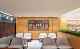 Skyhub Lounge seating area with wall art, Incheon International Airport Terminal 1.