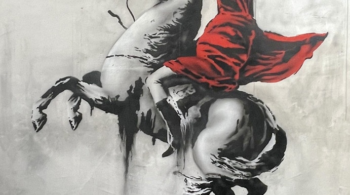 Banksy artwork of a hooded figure on a rearing horse at Amsterdam museum.