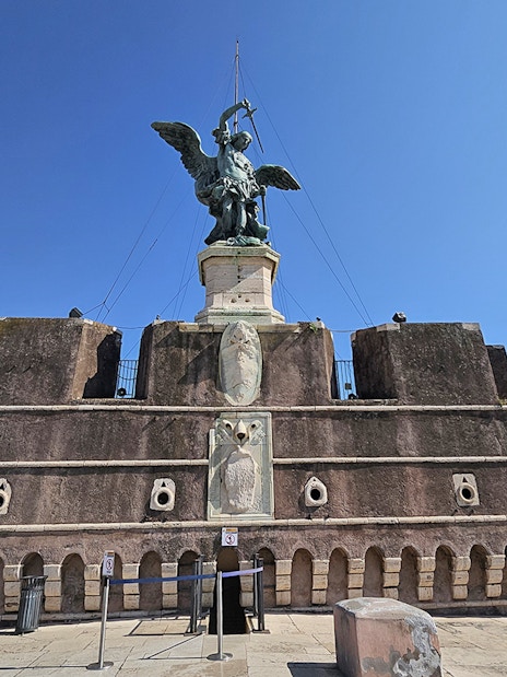 Bronze statue of Archangel Michael atop Castel Sant'Angelo, Rome.