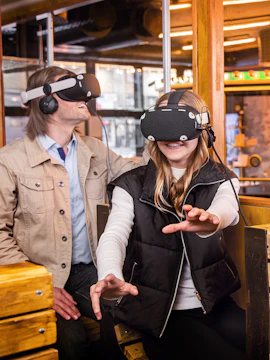 Visitors experiencing virtual reality tour with TimeRide.