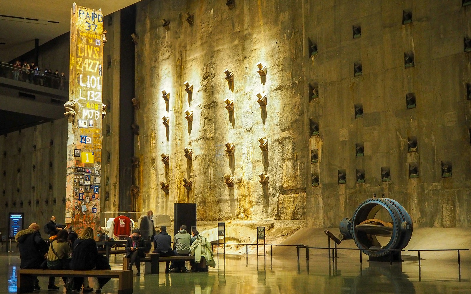 Visitors at the Last Column exhibit in the 9/11 Museum, New York City.