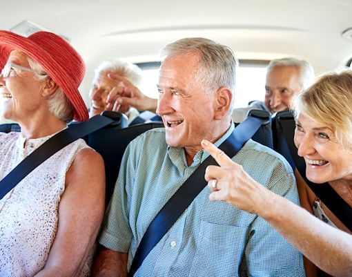 Guests viewing Hluboká Castle during transfer on Prague to Český Krumlov day trip.