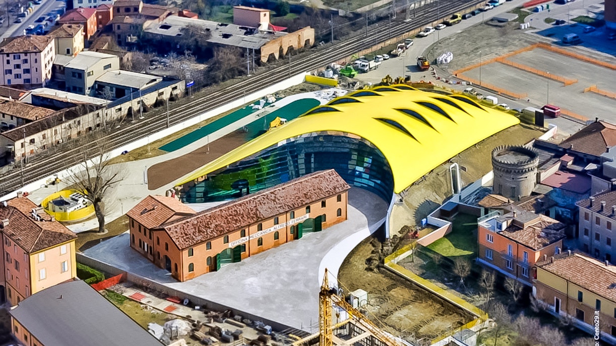 Aerial view of Museo Enzo Ferrari Modena with its distinctive yellow roof.