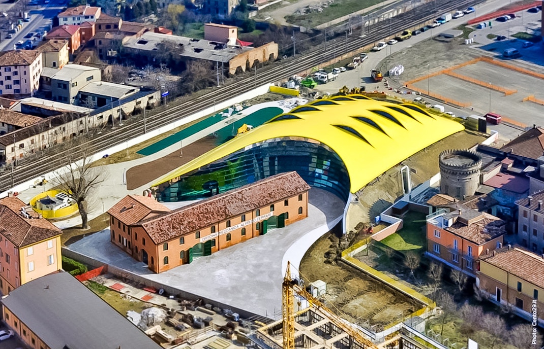 Aerial view of Museo Enzo Ferrari Modena with its distinctive yellow roof.