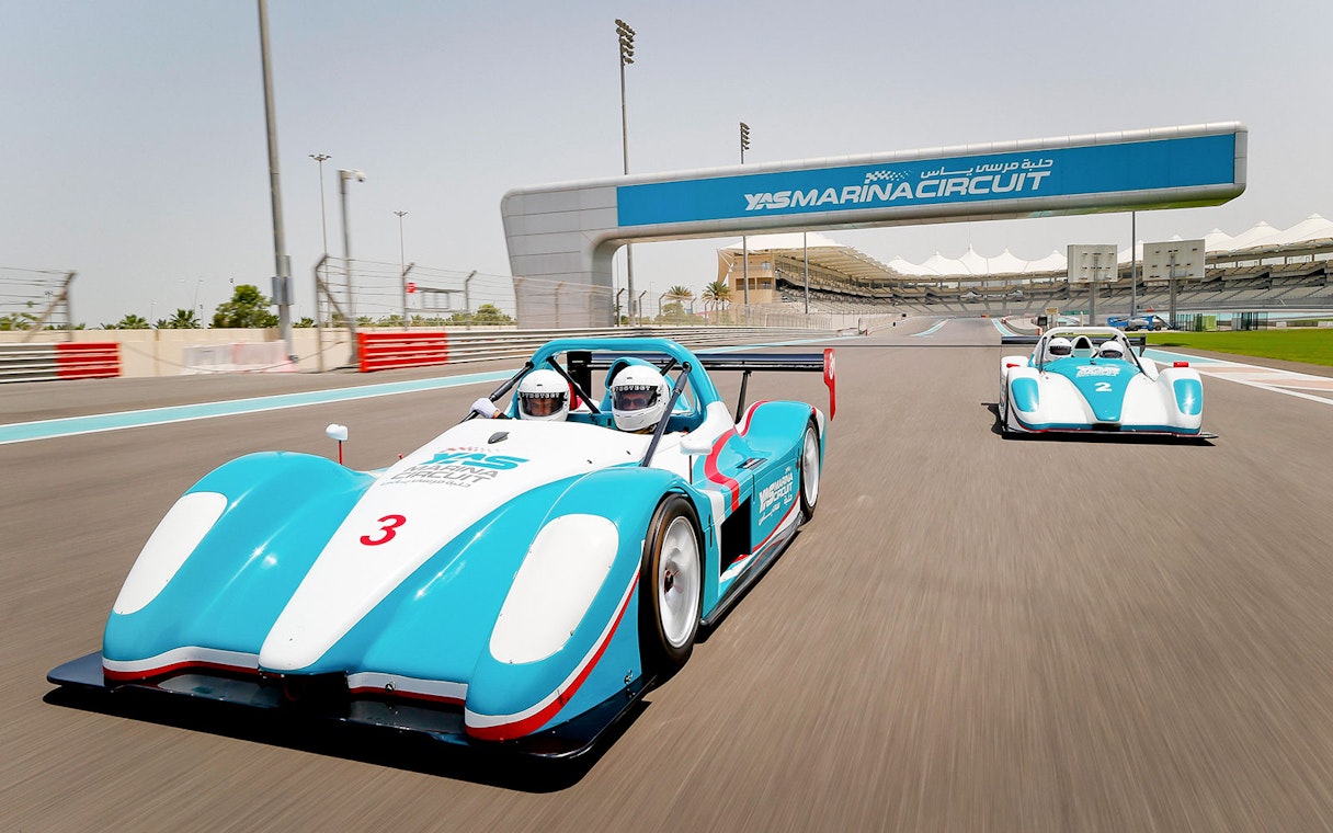 Race cars on track at Yas Marina Circuit during YAS Radical SST Passenger experience.