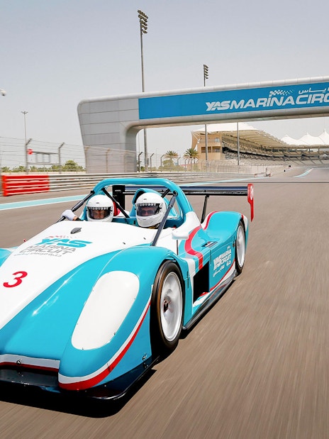 Race cars on track at Yas Marina Circuit during YAS Radical SST Passenger experience.