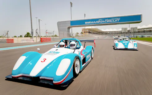 Race cars on track at Yas Marina Circuit during YAS Radical SST Passenger experience.