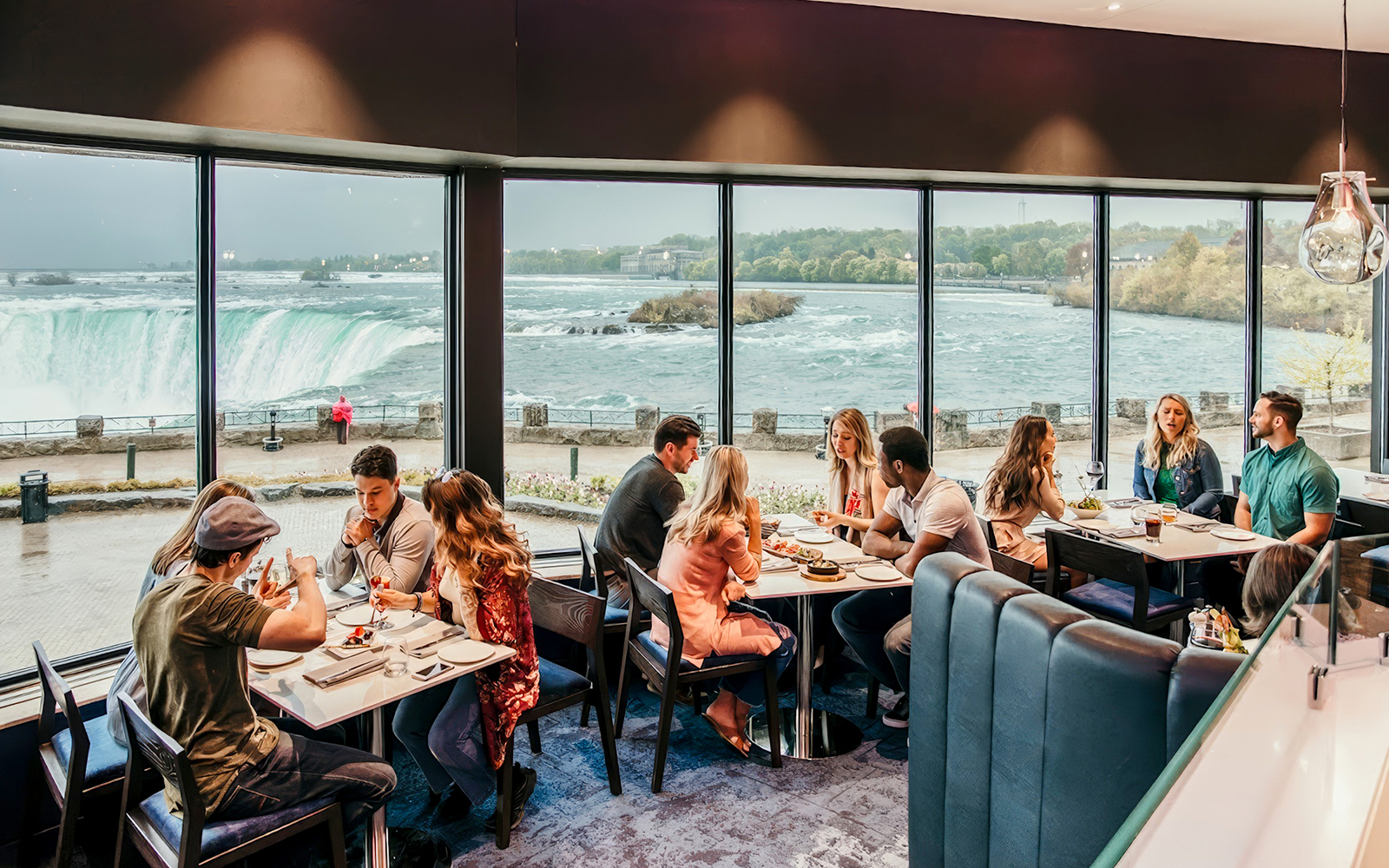 Dining with a view of Niagara Falls at Skylon Tower, Canada.