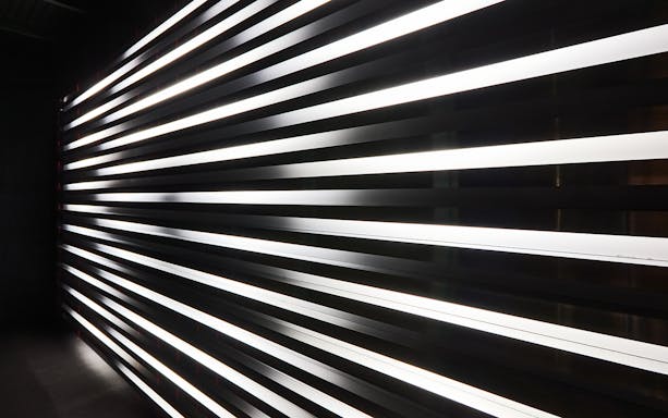 Light installation at Light Art Museum with illuminated horizontal lines.