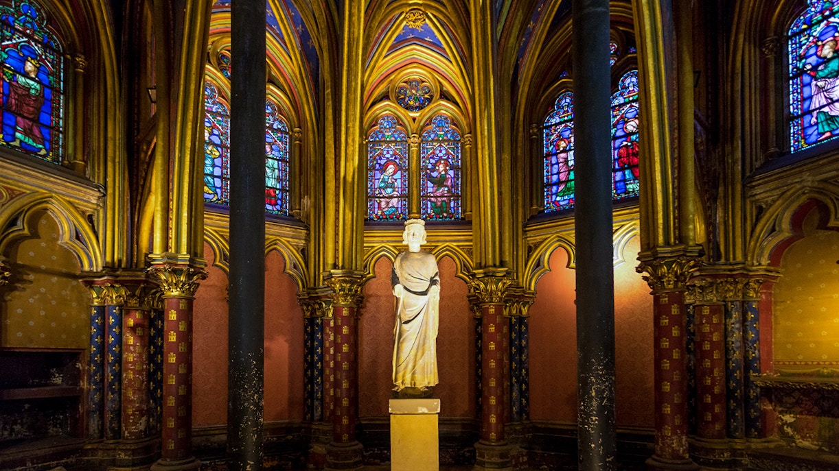 Notre Dame Cathedral Paris statues detail with intricate carvings and historical figures.
