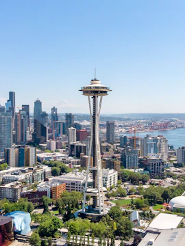 Aerial view of Seattle's Space Needle with city skyline and waterfront.