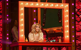 Performer at makeup table during RuPaul's Drag Race LIVE! show in Las Vegas.