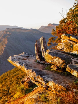 Rocky cliff edge at sunset in Grampians National Park, Australia.