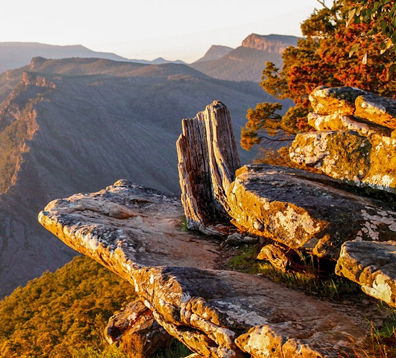 Rocky cliff edge at sunset in Grampians National Park, Australia.