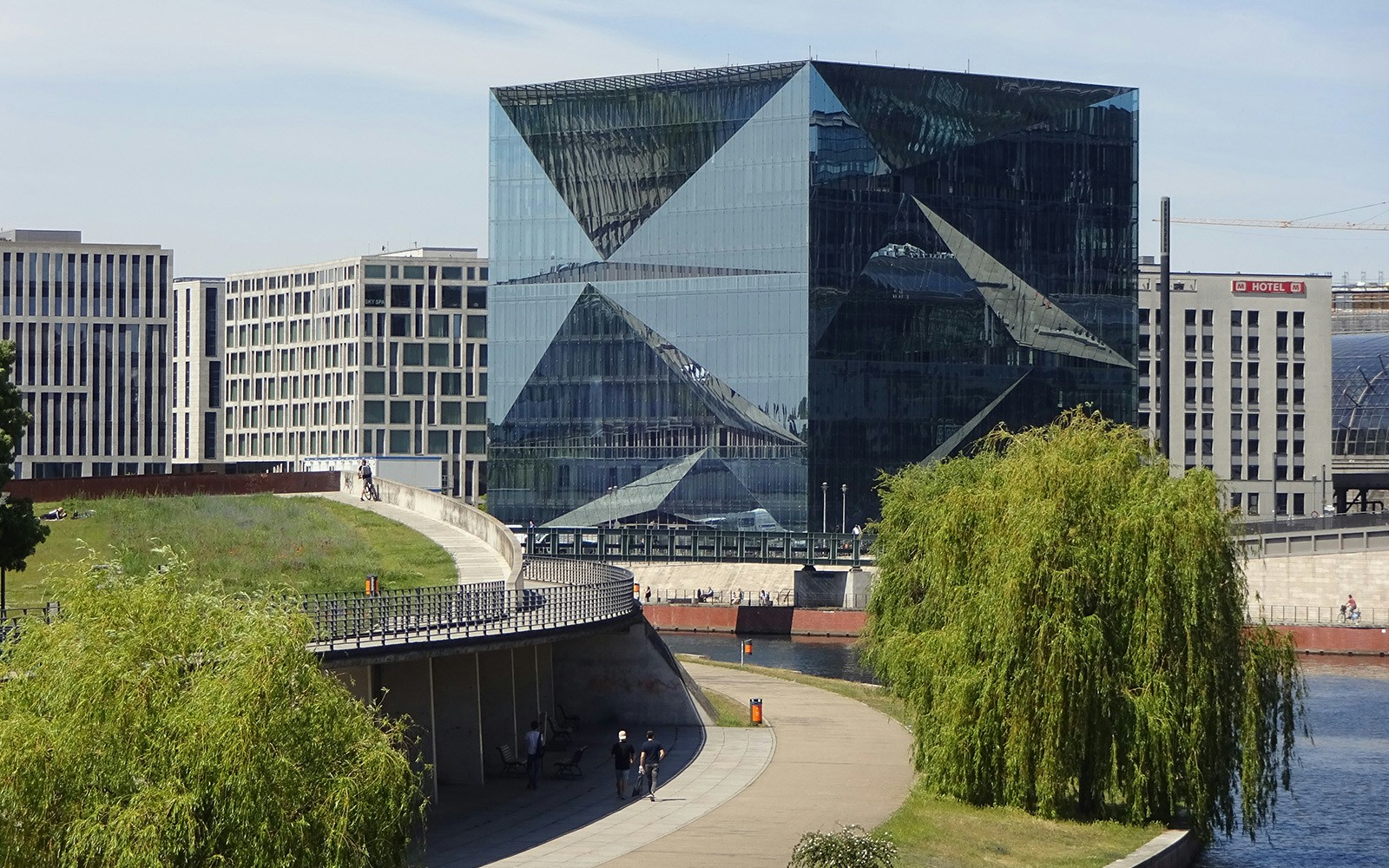 Modern glass building along the River Spree in Berlin, seen from a sightseeing cruise.