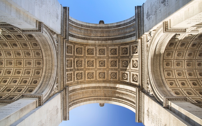 Intricate ceiling details of the Arc de Triomphe in Paris, France.