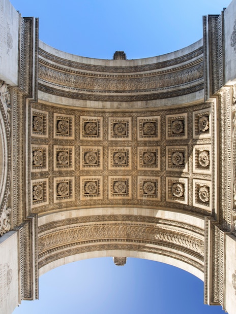 Intricate ceiling details of the Arc de Triomphe in Paris, France.