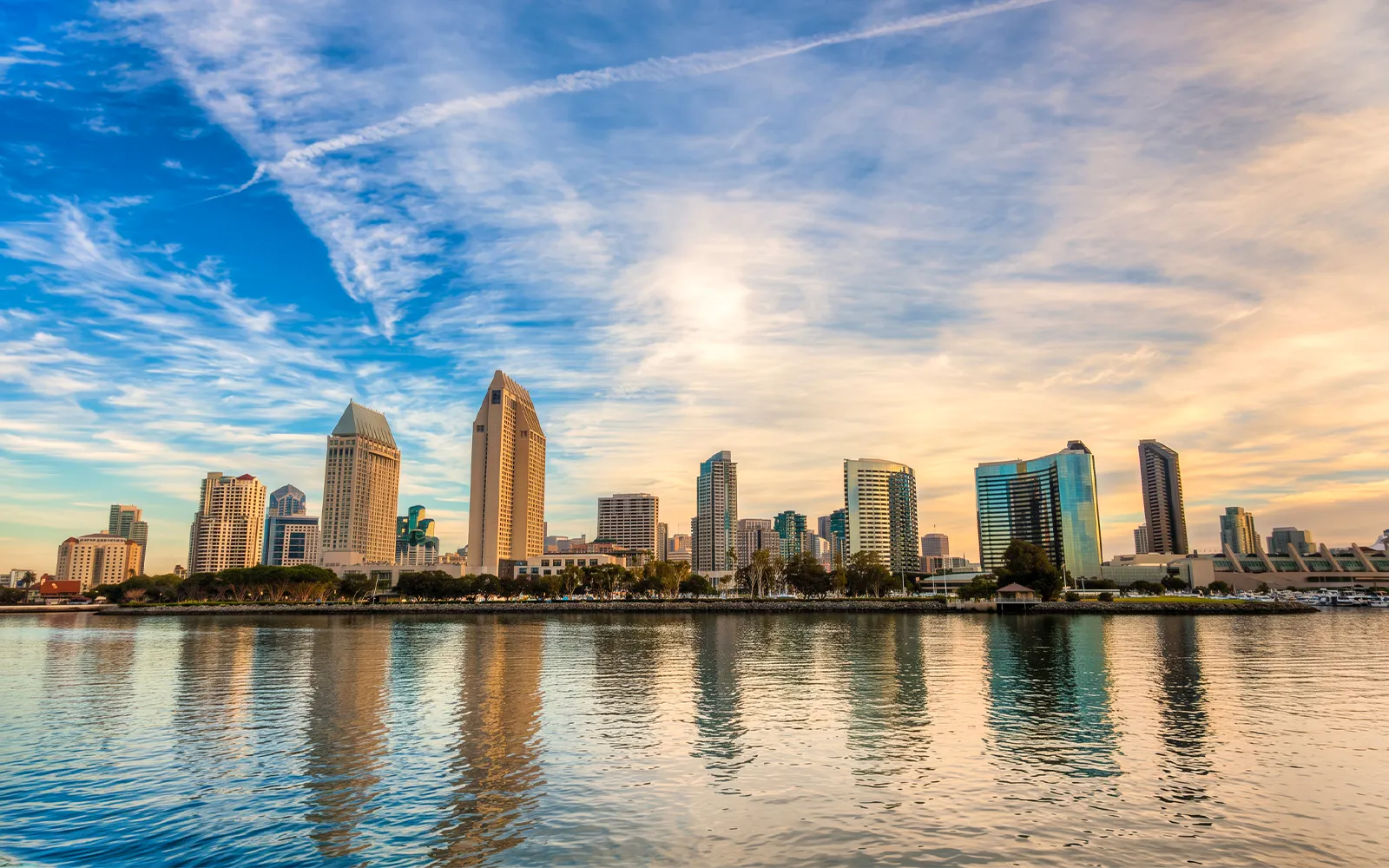 San Diego skyline view from the Premier Dinner Cruise at sunset.