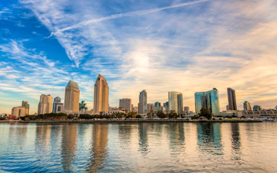 San Diego skyline view from the Premier Dinner Cruise at sunset.