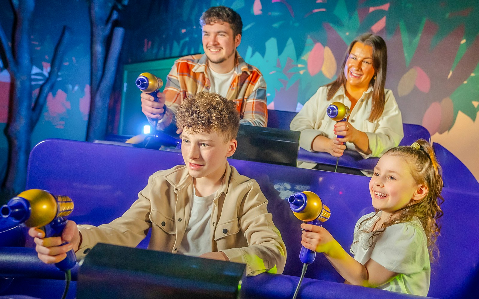 Visitors enjoying an interactive ride at Cadbury World.