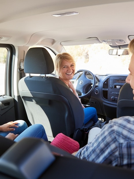 Tourists enjoying van transfer from Tirana to Bovilla Lake.