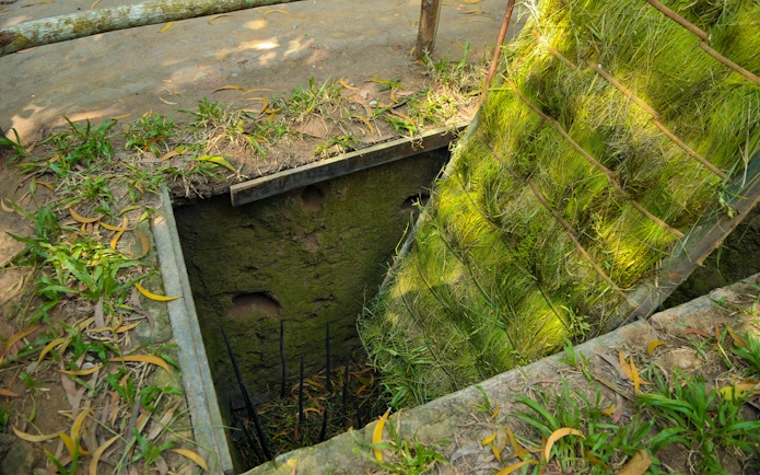 Trapdoor with spikes at Cu Chi Tunnel, Vietnam War.
