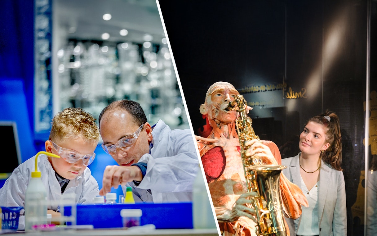 Child and adult conducting experiment at NEMO Science Museum Labratorium.