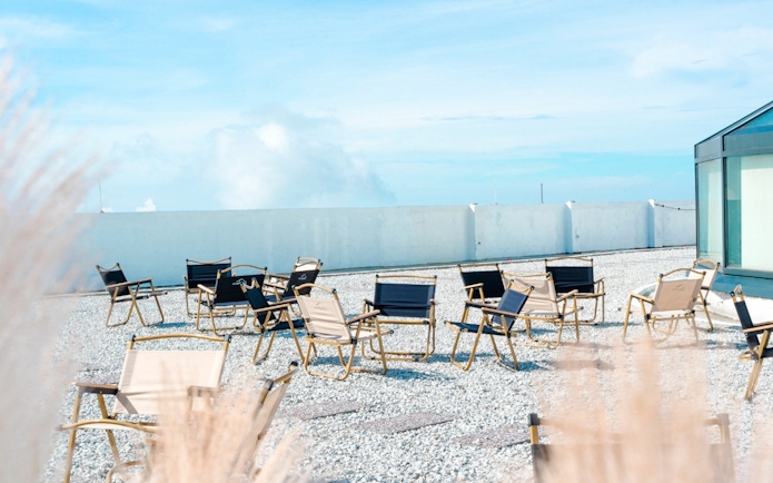 Chairs on rooftop with blue sky at Hoverland, Wyndham Ion Majestic Hotel, Genting Highlands.
