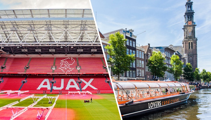 Johan Cruijff Arena exterior with sightseeing cruise boat on Amsterdam canal.