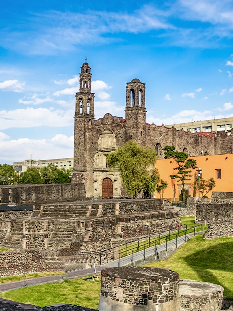 Plaza of Three Cultures in Mexico City with ancient ruins and colonial church.