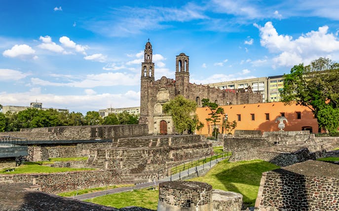 Plaza of Three Cultures in Mexico City with ancient ruins and colonial church.