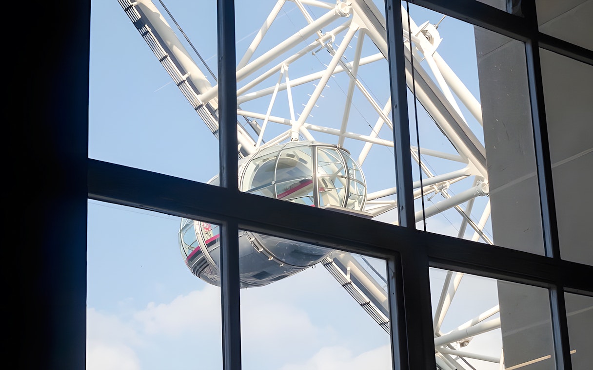 London Eye capsule viewed through County Hall window.