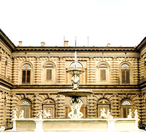 Palazzo Pitti courtyard with ornate fountain, Florence, Italy.